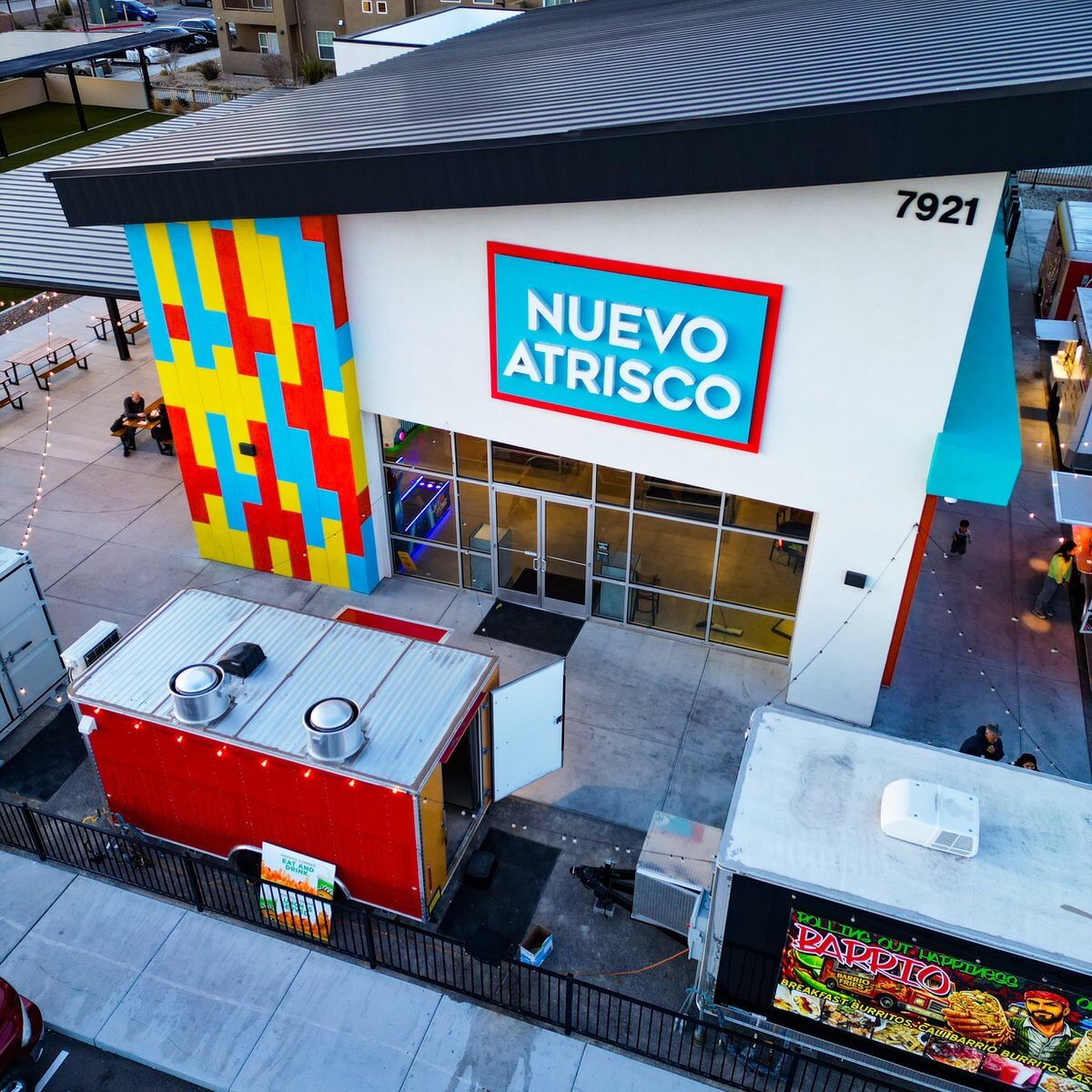 Aerial view of the Nuevo Atrisco building and food trucks